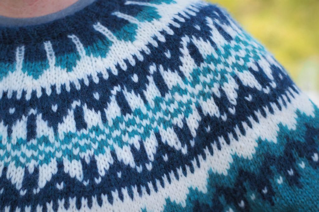 closeup of Eldfell Pullover yoke in turquoise